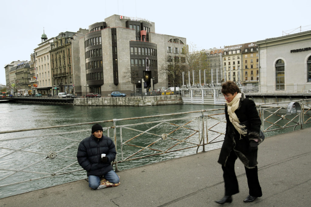 Homeless man begs money in Geneva, Switzerland - 2005