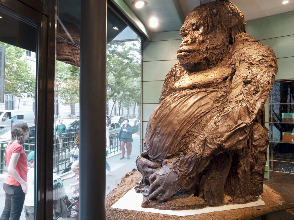 A giant gorilla, made in chocolate, stands in the shop window of a chocolate-maker and seller, Paris - 2011